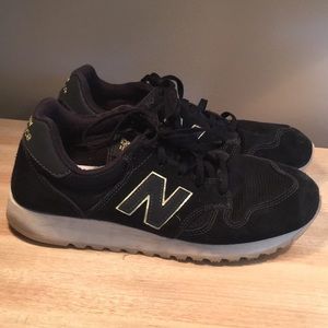 Women’s Black/Gold Suede New Balance 520